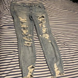 High Waisted elastic ripped jeans